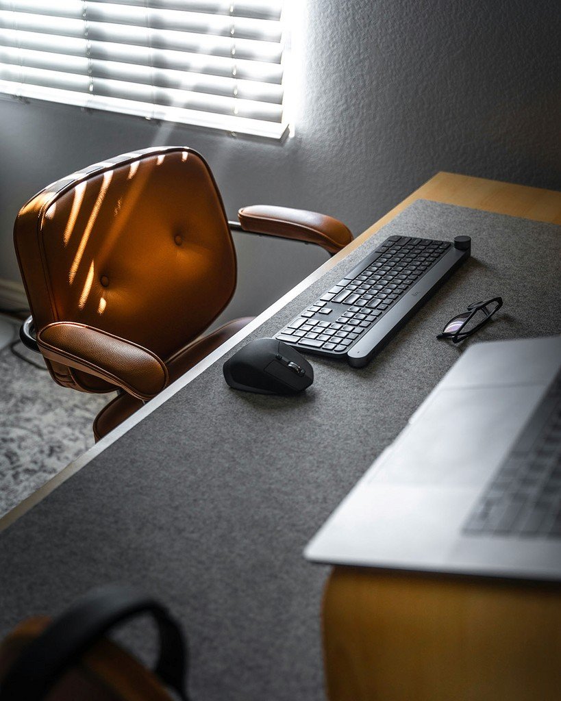 Illustrative laptop and notebook for research